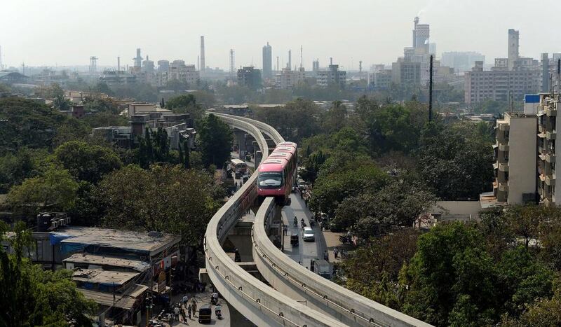 The monorail is part of a wider plan to decongest Mumbai’s heavy traffic and overcrowded trains and modernise the city. Above, a monorail train makes its way during a trial run last week. Indranil Mukherjee / AFP

