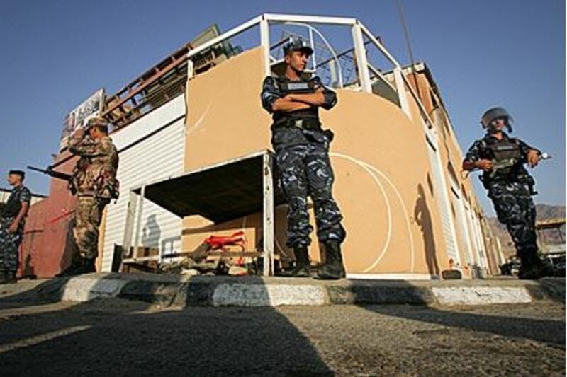 Jordanian security personnel guard the base of a rocket attack on US ships in 2005. Jordan denied rockets targeting Israelis over the past three months were launched from its territory.