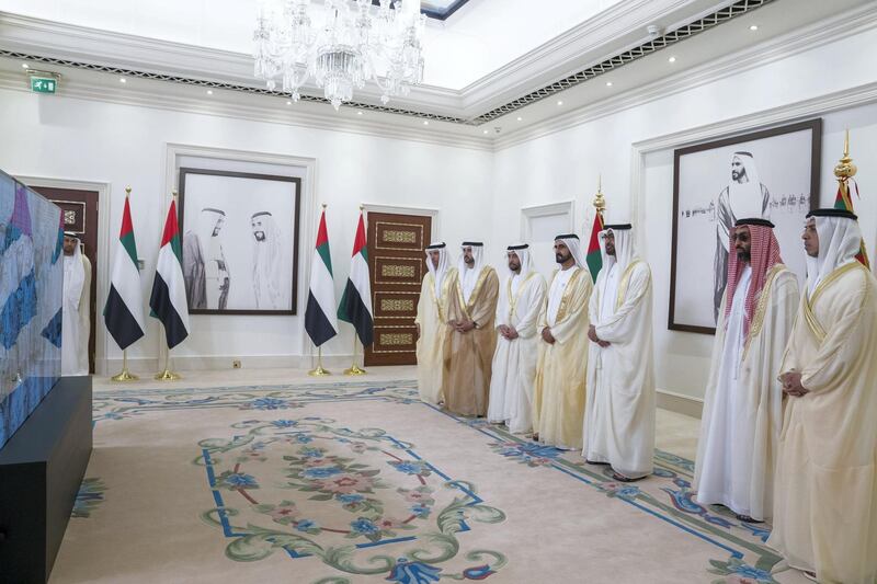 ABU DHABI, UNITED ARAB EMIRATES - August 21, 2018: (L-R) HH Sheikh Hazza bin Zayed Al Nahyan, Vice Chairman of the Abu Dhabi Executive Council, HH Sheikh Hamdan bin Mohamed Al Maktoum, Crown Prince of Dubai, HH Sheikh Hamdan bin Zayed Al Nahyan, Ruler’s Representative in Al Dhafra Region, HH Sheikh Mohamed bin Rashid Al Maktoum, Vice-President, Prime Minister of the UAE, Ruler of Dubai and Minister of Defence, HH Sheikh Mohamed bin Zayed Al Nahyan, Crown Prince of Abu Dhabi and Deputy Supreme Commander of the UAE Armed Forces, HH Sheikh Tahnoon bin Zayed Al Nahyan, UAE National Security Advisor and HH Sheikh Mansour bin Zayed Al Nahyan, UAE Deputy Prime Minister and Minister of Presidential Affairs participate in a live video call with UAE Armed Forces in Yemen during an Eid Al Adha reception at Mushrif Palace. 

( Mohamed Al Hammadi / Crown Prince Court - Abu Dhabi )
---