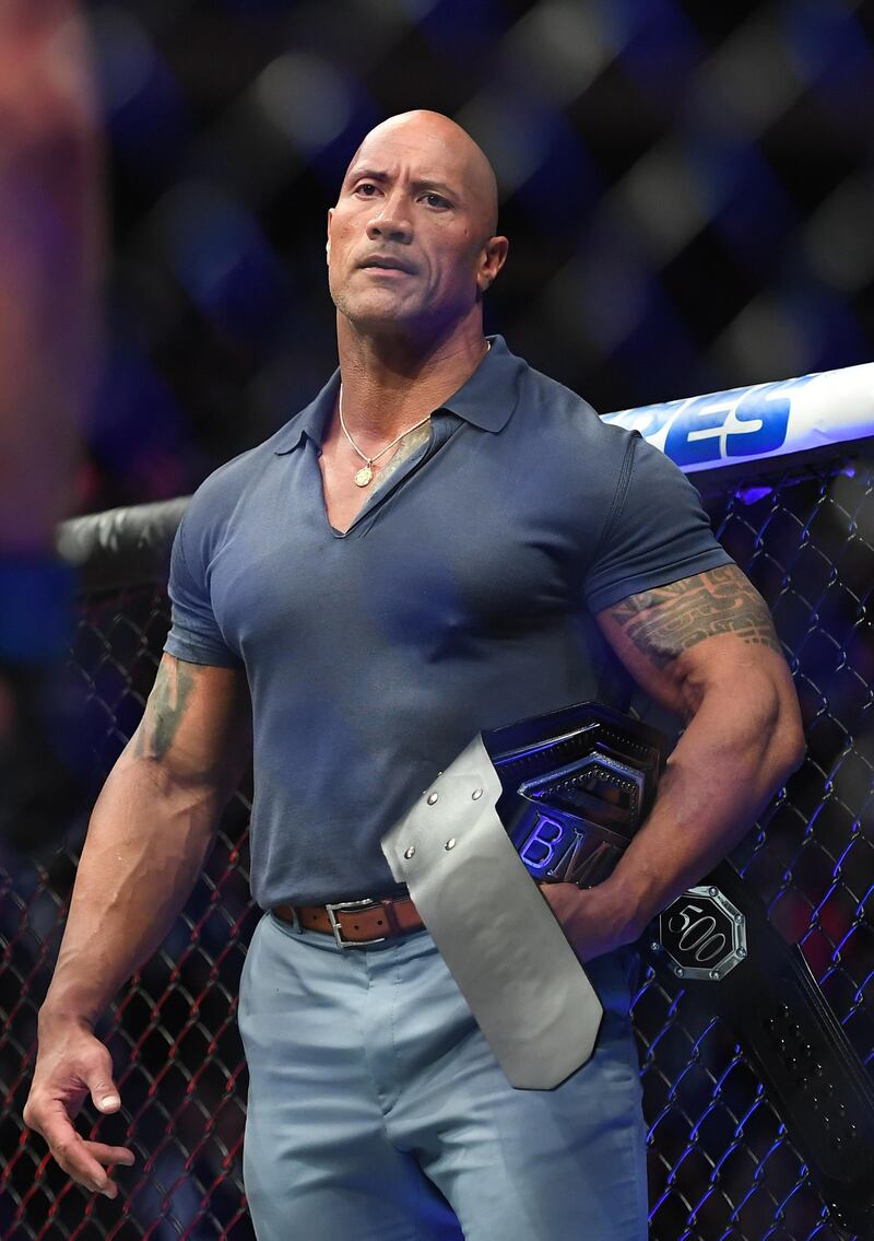 Dwayne Johnson aka The Rock prepares to present the BMF belt after the fight between Jorge Masvidal and Nate Diaz at UFC 244. Reuters