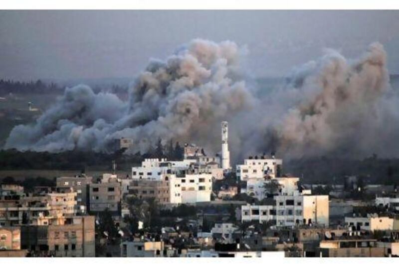Smoke rises following explosions caused by Israeli military operations in Gaza in this 2009 photo. Years after this attack, Israeli human rights groups are being targeted by right-wing politicians and groups because they alleged Israel committed war crimes during the invasion.