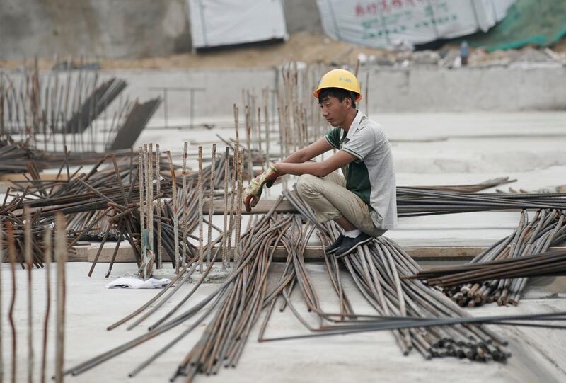 A labourer rests at a construction site in Beijing, China July 20, 2017. Picture taken July 20, 2017. REUTERS/Jason Lee