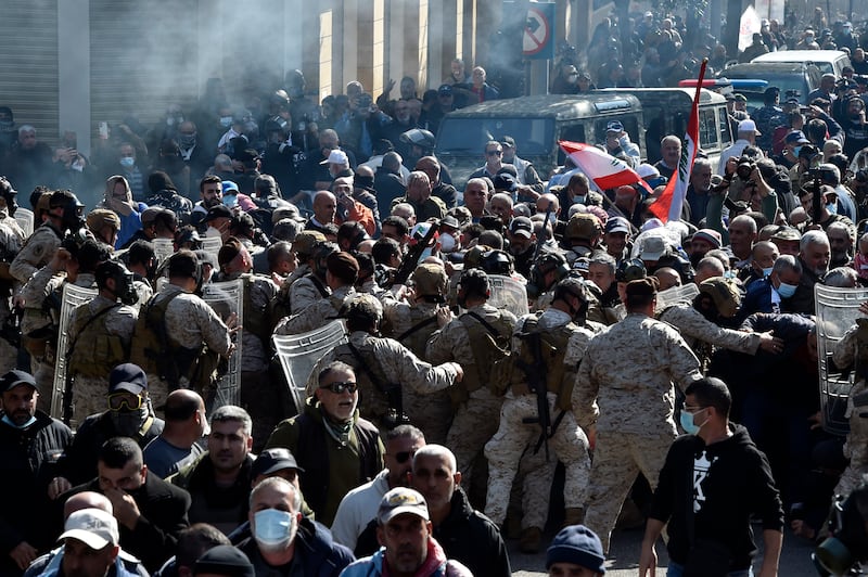 Protesters and soldiers clash outside the government palace in downtown Beirut. EPA