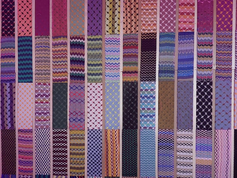 Hirbawi produces the scarves in a range of hues and patterns. Sarah Maisey / The National