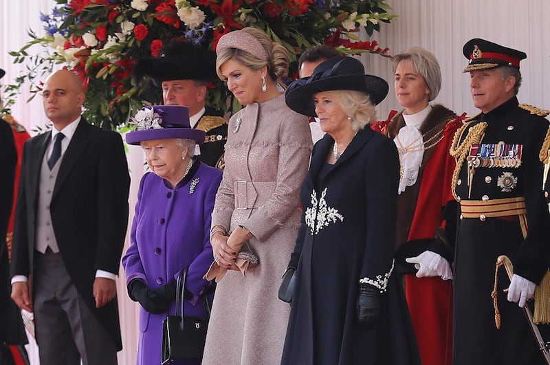 King Willem-Alexander of the Netherlands, Britain's Queen Elizabeth, Queen Maxima of the Netherlands, Prince Charles, and Camilla, Duchess of Cornwall stand during a ceremonial welcome at the start of a state visit at Horse Guards Parade in London. Christopher Furlong / Reuters