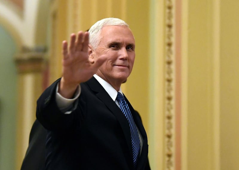 FILE - In this Jan. 3, 2018, file photo, Vice President Mike Pence waves as he walks on Capitol Hill in Washington. Pence is making his fifth visit to Israel, returning to a region heâ€™s visited â€œa million times" in his heart. An evangelical Christian with strong ties to the Holy Land, Pence this time comes packing two key policy decisions in his bags that have long been top priorities for him: designating Jerusalem as Israel's capital and curtailing aid for Palestinians.(AP Photo/Susan Walsh, File)