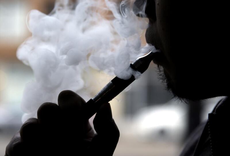Chemicals in most e-cigarettes had not been associated with any serious risk, a study by Public Health England showed last year. AP Photo

