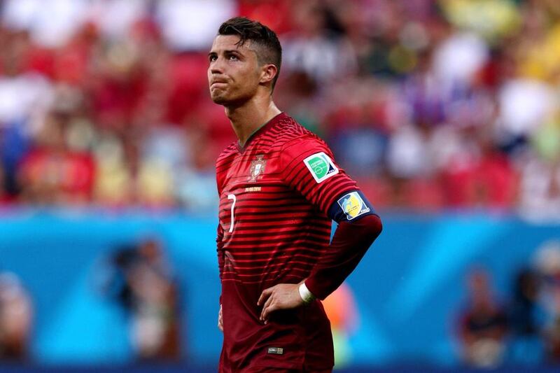 Cristiano Ronaldo of Portugal reacts during their 2-1 win over Ghana on Thursday at the 2014 World Cup in Brasilia, Brazil. Despite the win, Portugal were eliminated from the tournament, finishing third in Group G. Adam Pretty / Getty Images / June 26, 2014