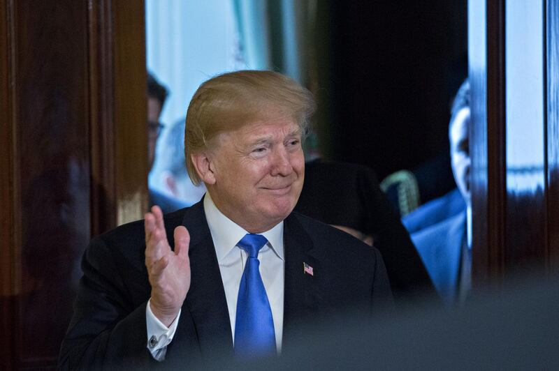 U.S. President Donald Trump arrives to speak during a Greek Independence Day celebration in the East Room of the White House in Washington, D.C., U.S., on Thursday, March 22, 2018. Trump today took his boldest step to level the economic playing field with China, ordering sweeping tariffs on Chinese goods in a move that could escalate already tense trade relations between the worlds two biggest economies. Photographer: Andrew Harrer/Bloomberg