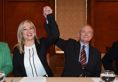 Michelle O'Neill celebrated with former IRA member Martin McGuinness when she was unveiled as Sinn Fein's leader in Northern Ireland in 2017. Getty Images 