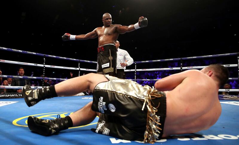 Dillian Whyte knocks down Joseph Parker. AP Photo