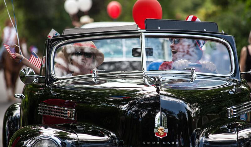 Parades throughout the streets of America are a Fourth of July tradition and give classic car owners a chance to strut their stuff. Photo: Robert Couse-Baker