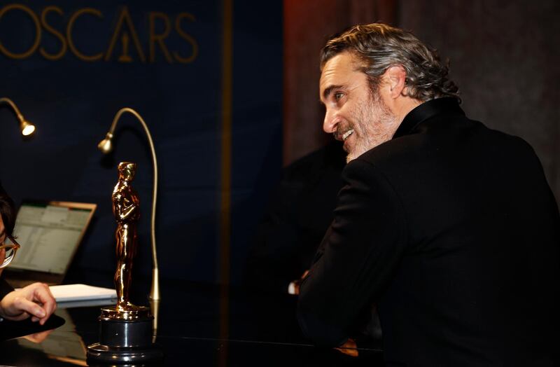 Best Actor Joaquin Phoenix waits for his Oscar statue to be engraved at the Governors Ball  at the Governors Ball after the Oscars on Sunday, February 9, 2020, at the Dolby Theatre in Los Angeles. Reuters