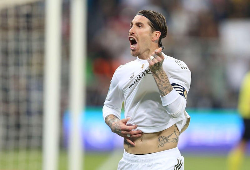 Sergio Ramos celebrates after scoring the decisive penalty in the shootout. EPA
