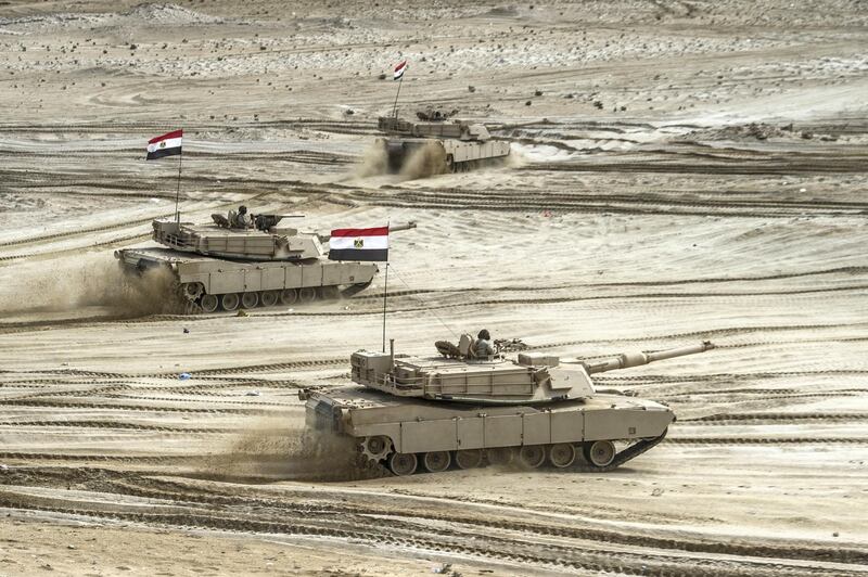 Egyptian tanks take part in the Arab Shield military exercises in the Matrouh Governorate Mohamed Naguib miilitary base, northwest of the capital Cairo on November 15, 2018. - Forces from Saudi Arabia, Egypt, the UAE, Kuwait, Bahrain and Jordan are taking part in the maneuvers. (Photo by Khaled DESOUKI / AFP)