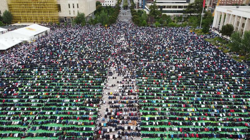Albanian Muslims celebrate Eid al-Fitr prayers in Skanderbeg Square in Tirana, Albania. Reuters