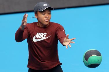 MELBOURNE, AUSTRALIA - JANUARY 05: Naomi Osaka of Japan trains during a practice session during day three of the Melbourne Summer Events at Melbourne Park on January 05, 2022 in Melbourne, Australia. (Photo by Kelly Defina / Getty Images)