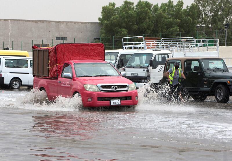 Dubai, United Arab Emirates - Flooded street due to rain today in Al Quoz Industrial area.  Leslie Pableo for The National 