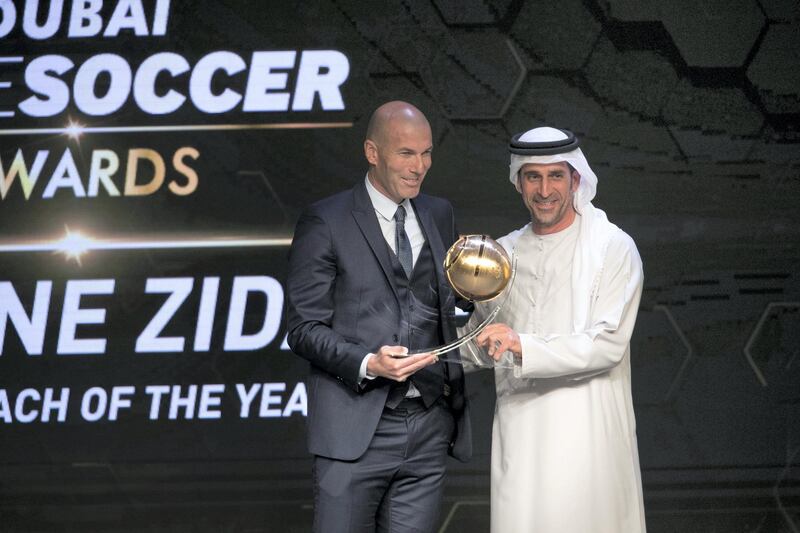 DUBAI, UNITED ARAB EMIRATES - DEC 28, 2017. 

Zinedine Zidane receives Best Coach of the Year Award from Abdullah Khalifa Al Merri during the Globe Soccer Awards 2017.

(Photo by Reem Mohammed/The National)

Reporter: 

Section: SP