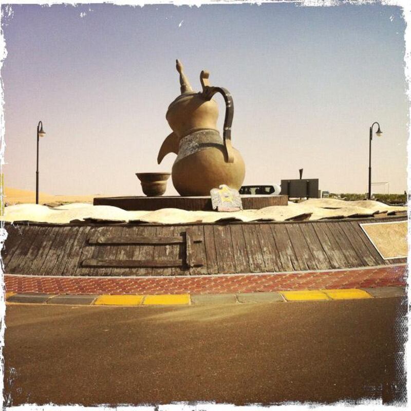 Day trip with friends to the Western Region and the Mazayin Dhafra Camel Festival, 220 kms west of Abu Dhabi on December 20, 2013.  Traffic circle outside the Tilal Liwa Hotel.  Picture taken with the Hipstamatic app for the iPhone. Liz Claus / The National