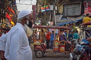 An electric rickshaw in New Delhi, India. The IEA expects 230 million electric vehicles to be on the roads by 2030. AP