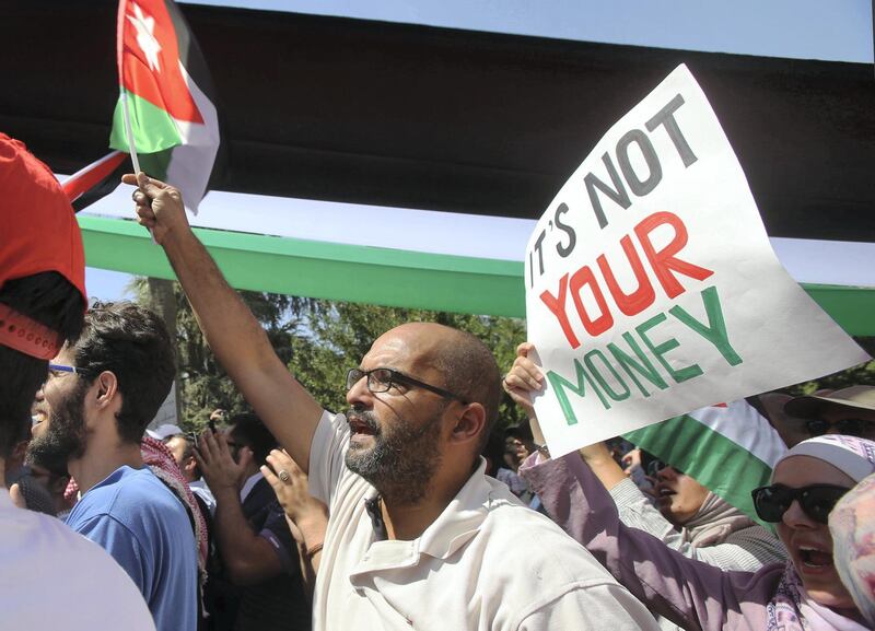 Jordanians protest at the professional Associations compound during the second country's strike refusing the new incom law draft  in Amman, Jordan, on May 30, 2018. Angry protesters refused and forced the professional associations council to withdraw giving the government a chance and to continue the strike. (Salah Malkawi for The National)