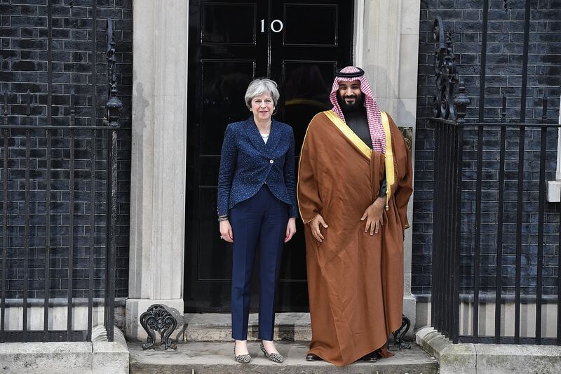 Saudi Crown Prince Mohammed bin Salman with Ms May on the steps of 10 Downing Street in March 2018