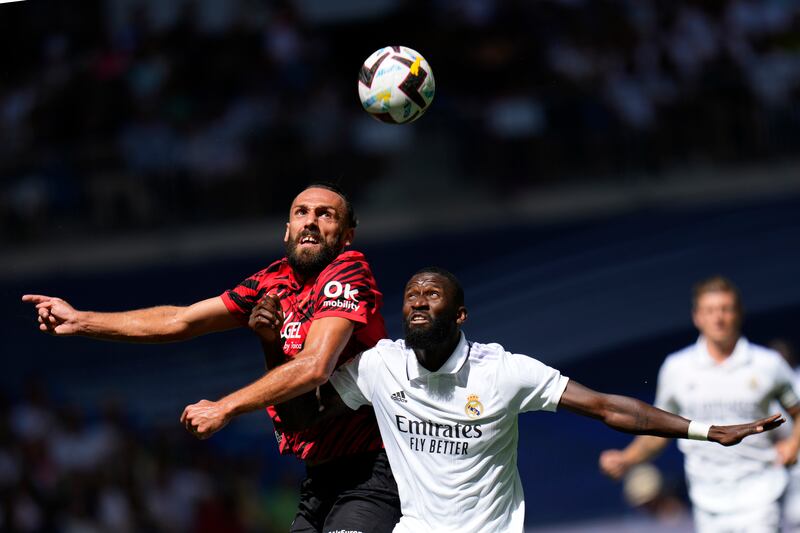  Mallorca's Vedat Muriqi and Antonio Rudiger of Real Madrid challenge for a header. AP