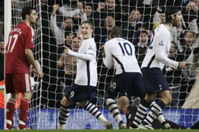 Tottenham's Roman Pavlyuchenko, Darren Bent and Vedran Corluka celebrate their first goal against Liverpool.