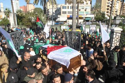 Mourners carry the casket of a Hamas fighter reportedly killed by a drone strike in southern Lebanon. AFP