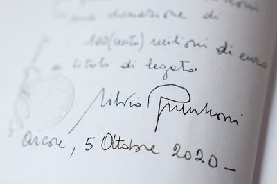 A photocopy of the handwritten will of former Italian Prime Minister Silvio Berlusconi. Reuters