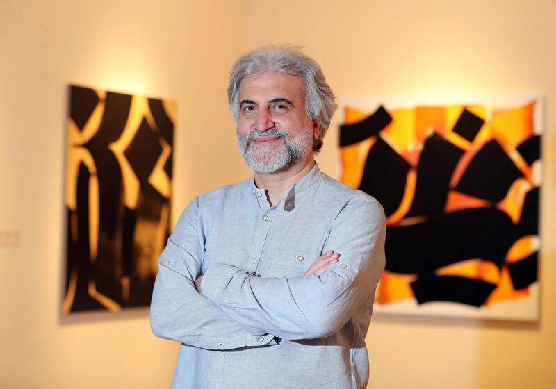 Sharjah, United Arab Emirates - November 04, 2019: Artist, Bahman Panahi. Sharjah Calligraphy Museum opens new exhibition ÔMusic of LettersÕ, artwork by Bahman Panahi. Monday the 4th of November 2019. Sharjah. Chris Whiteoak / The National