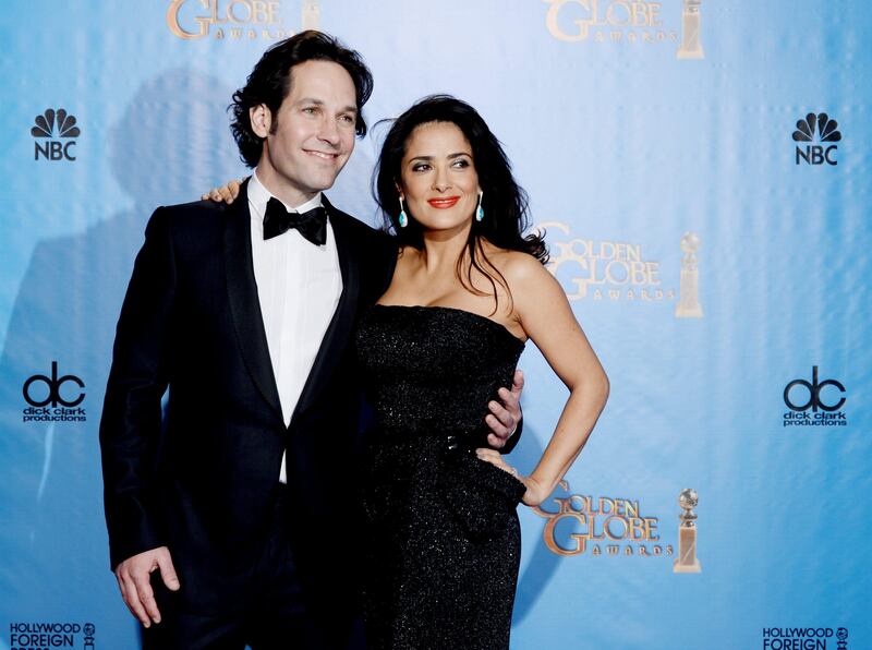 Actors Paul Rudd (L) and Salma Hayek pose in the press room during the 70th Annual Golden Globe Awards held at The Beverly Hilton Hotel on January 13, 2013 in Beverly Hills, California.   Kevin Winter/Getty Images/AFP== FOR NEWSPAPERS, INTERNET, TELCOS & TELEVISION USE ONLY ==
 *** Local Caption ***  252401-01-09.jpg