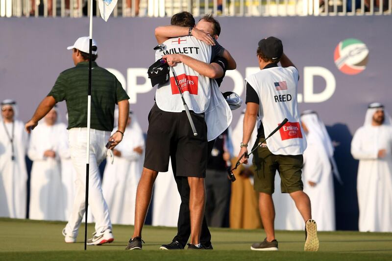 Danny Willett of England hugs his caddie, Sam Haywood following victory in the final round during day four of the DP World Tour Championship at Jumeirah Golf Estates in Dubai, United Arab Emirates. Getty Images