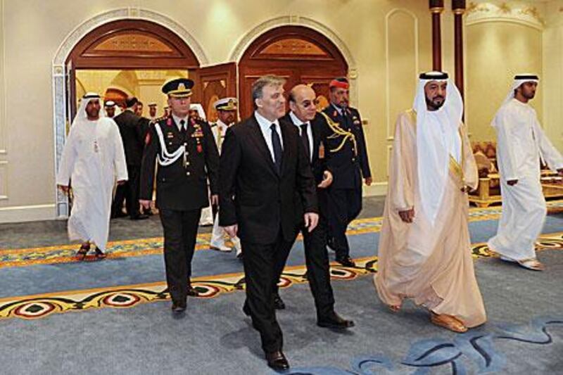 The President, Sheikh Khalifa, and his Turkish counterpart Abdullah Gul at a ceremony in the capital during the Turkish leader’s visit last month.