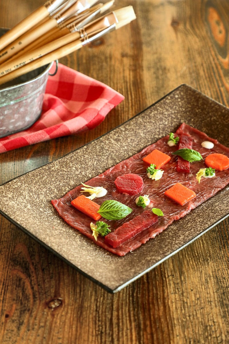 Robert Delaunay is a beef carpaccio with root vegetables and Parmesan fondue, plated to mimic Delaunay’s strong colours and geometric shapes