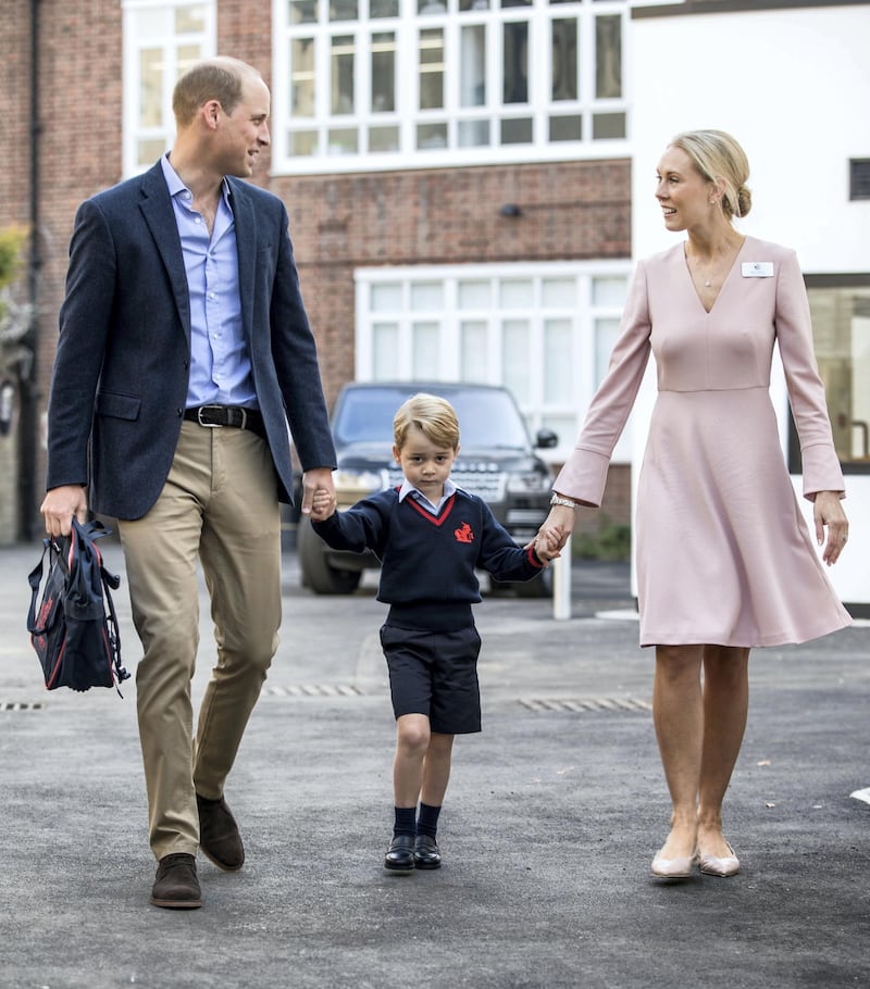 LONDON, ENGLAND - SEPTEMBER 7: Prince George of Cambridge arrives for his first day of school with his father Prince William, Duke of Cambridge as they are met Head of the lower school Helen Haslem at Thomas's Battersea on September 7, 2017 in London, England. (Photo by Richard Pohle - WPA Pool/Getty Images)