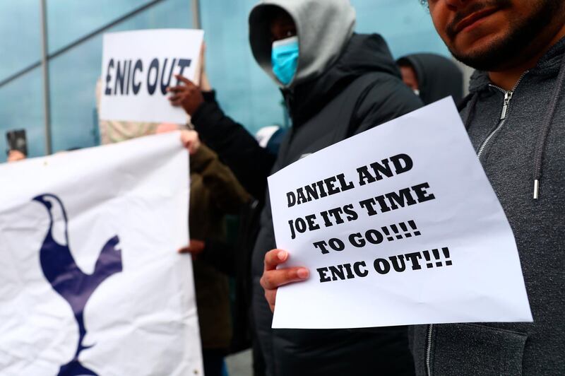 Tottenham supporters protest in front of Tottenham Hotspur Stadium. EPA