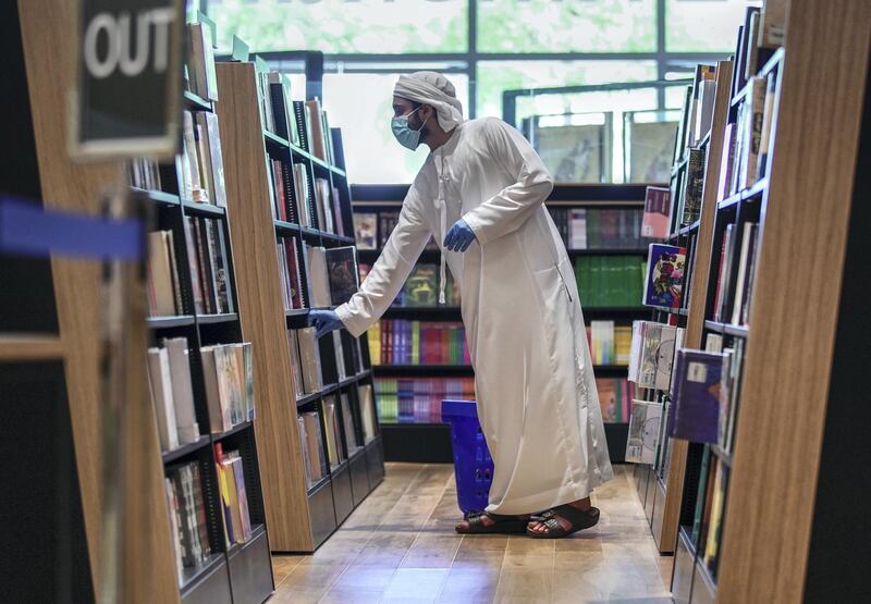 Abu Dhabi, United Arab Emirates, May 10, 2020.  
Book lovers at the newly opened Kinokuniya book shop at the Galleria Mall, Al Maryah Island, Abu Dhabi.
Victor Besa/The National
Section:  NA
Reporter: