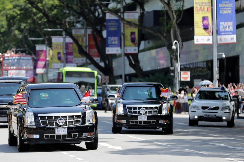 The car carrying US president Donald Trump heads into the Istana Presidential Palace. Mast Irham / EPA