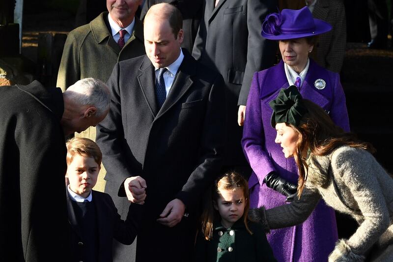 From left:  Britain's Prince George of Cambridge, Britain's Prince William, Duke of Cambridge, Britain's Princess Charlotte of Cambridge, Britain's Princess Anne, Princess Royal, and Britain's Catherine, Duchess of Cambridge, leave after the Royal Family's traditional Christmas Day service at St Mary Magdalene Church. AFP