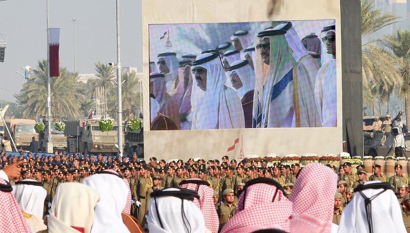 Qatari soldiers participate in a military parade in Doha.