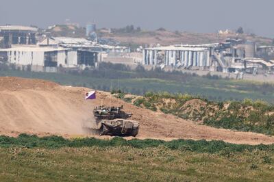An Israeli army tank on the border with Gaza amid ongoing fighting in the enclave. AFP