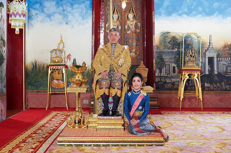 King Maha Vajiralongkorn poses with Thai royal consort Sineenat, in an image released by the royal palace of Thailand in August. AFP