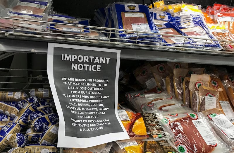 epa06582885 A sign to inform customers is placed over the processed cold meats section of a supermarket in Cape Town, South Africa, 05 March 2018. Supermarkets in South Africa have been warning customers and clearing some processed meats from the shelves after a food poisoning outbreak. 180 South Africans have died from Listeria poisoning.  The outbreak has been finally traced by the government to the Enterprise Food factory in Polokwane. According to the The United Nations, this is the largest outbreak of Listeriosis ever worldwide after 948 cases of poisoning have been reported since January 2017.  EPA/NIC BOTHMA