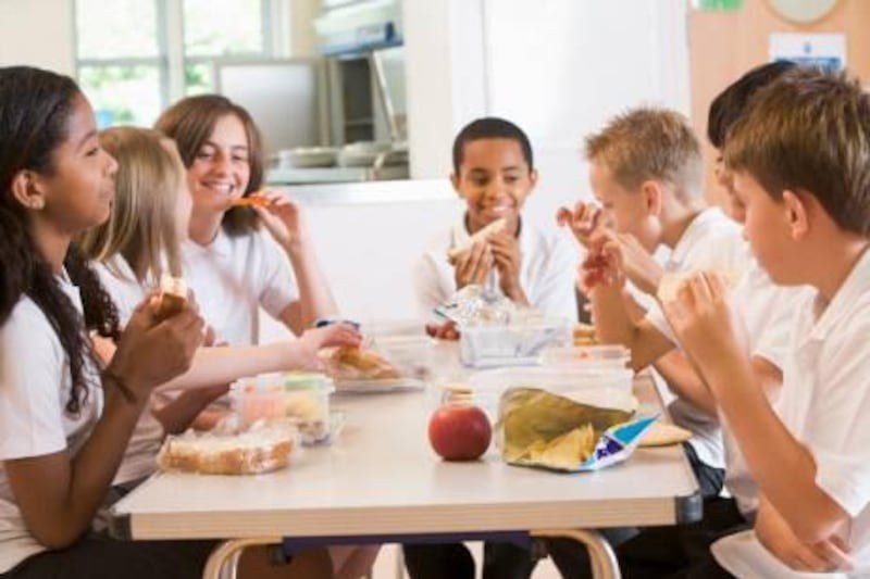 Schoolchildren enjoying their lunch in a school cafeteria

credit: istockphoto.com