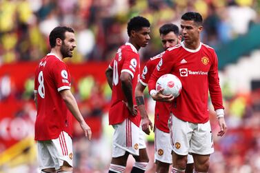 MANCHESTER, ENGLAND - APRIL 16: Cristiano Ronaldo of Manchester United prepares to take a free kick during the Premier League match between Manchester United and Norwich City at Old Trafford on April 16, 2022 in Manchester, England. (Photo by Naomi Baker / Getty Images)