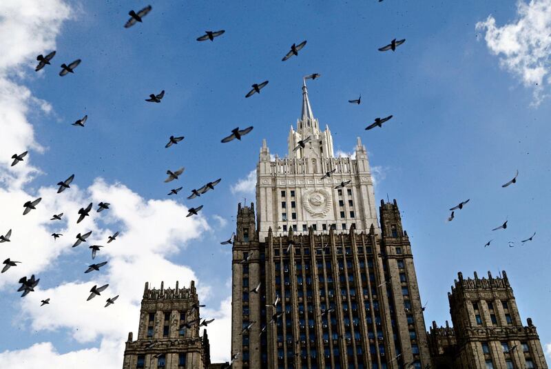 epa06635487 Pigeons fly in front of Russian Foreign Affairs Ministry building in Moscow, Russia, 29 March 2018. Fourteen countries in Europe, USA, Canada and Australia supported the decision of Britain to expel Russian diplomats, more than one hundred all together, related to the the use of a chemical weapon in the attempted murder of Sergei Skripal, a former Russian intelligence official, and his daughter, Yulia, in Salisbury, England, on 04 March 2018.  EPA/MAXIM SHIPENKOV