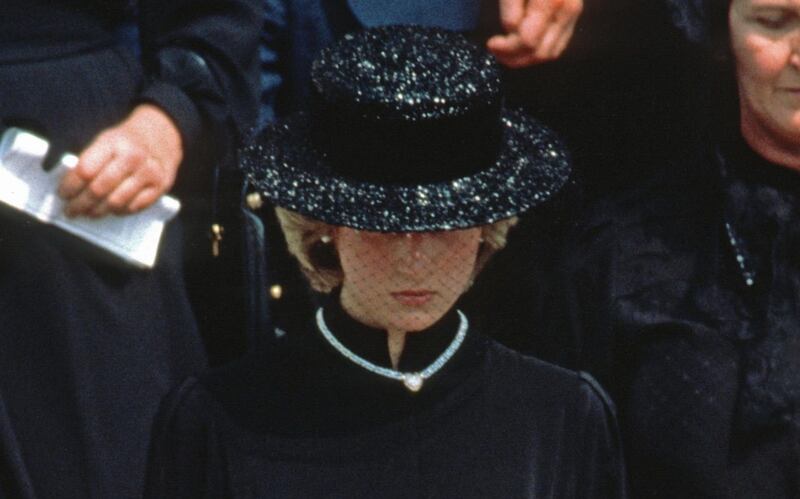 Diana, Princess of Wales wore a necklace with a single white pearl at the funeral of Princess Grace of Monaco in 1982. Getty
