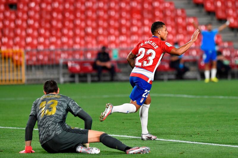 Darwin Machis (R) celebrates after scoring for Granada against Real Madrid. AFP